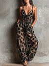 Roberta · Tuta ampia in chiffon nera con stampa animalier, scollo a halter e pantaloni a palazzo